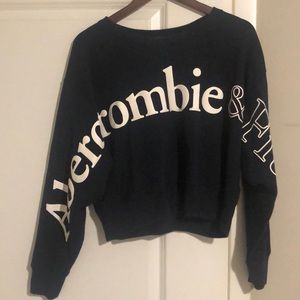Used. Good/ new condition. Navy, crop sweater, L
